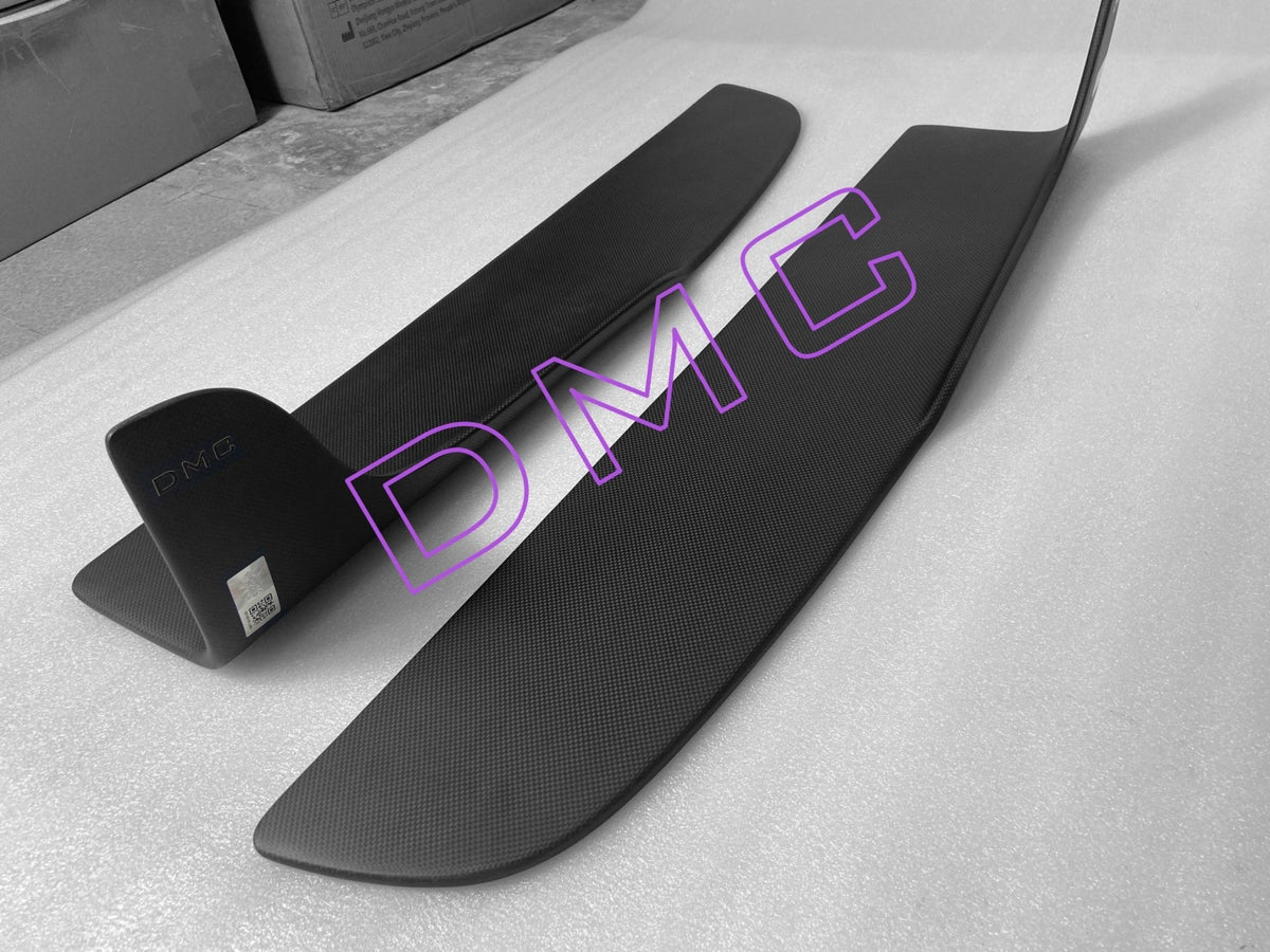 Bas de caisse latéraux en fibre de carbone de DMC pour Aston Martin DBS d'origine (2018 - 2025) - KDMPARTS EUROPE TUNING STORE